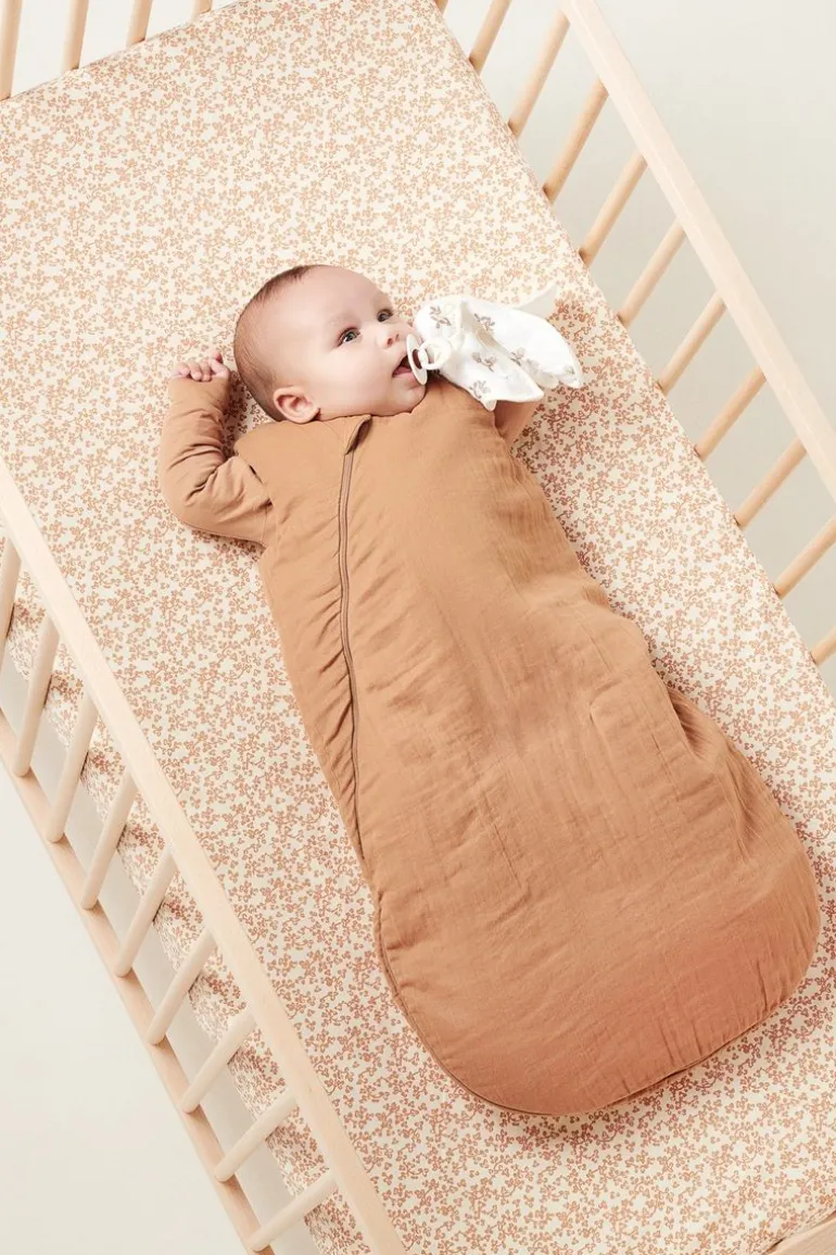 baby_slaapzak__seizoenen__9-2.webp Noppies Babykamer | Slaapzakken<Baby Slaapzak 4 Seizoenen Uni - Indian Tan
